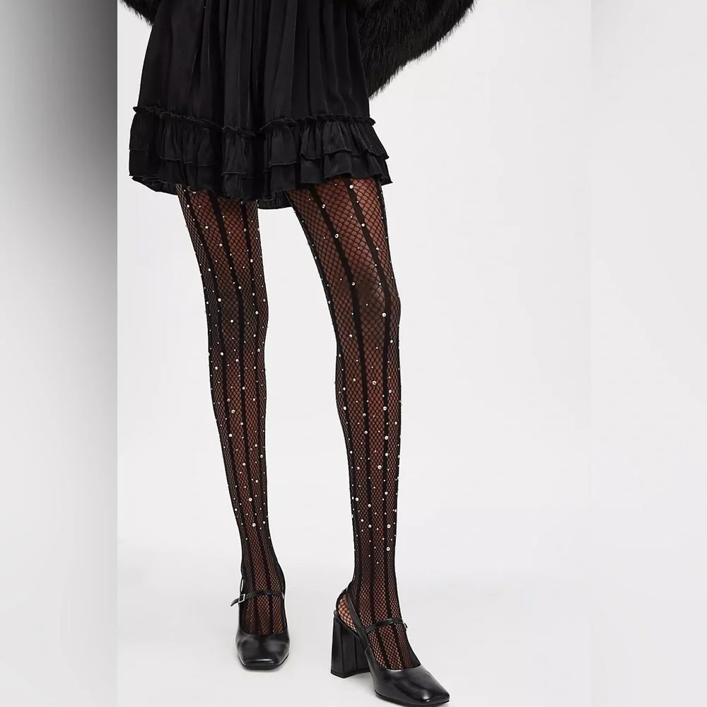 Free people X high heel jungle strobe glitter fishnet tights one size new in